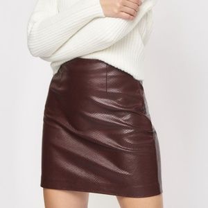 Dynamite burgundy wine snake print textured leather skirt